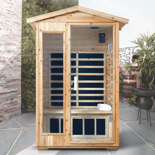 Wooden outdoor sauna with glass door and infrared heating panels