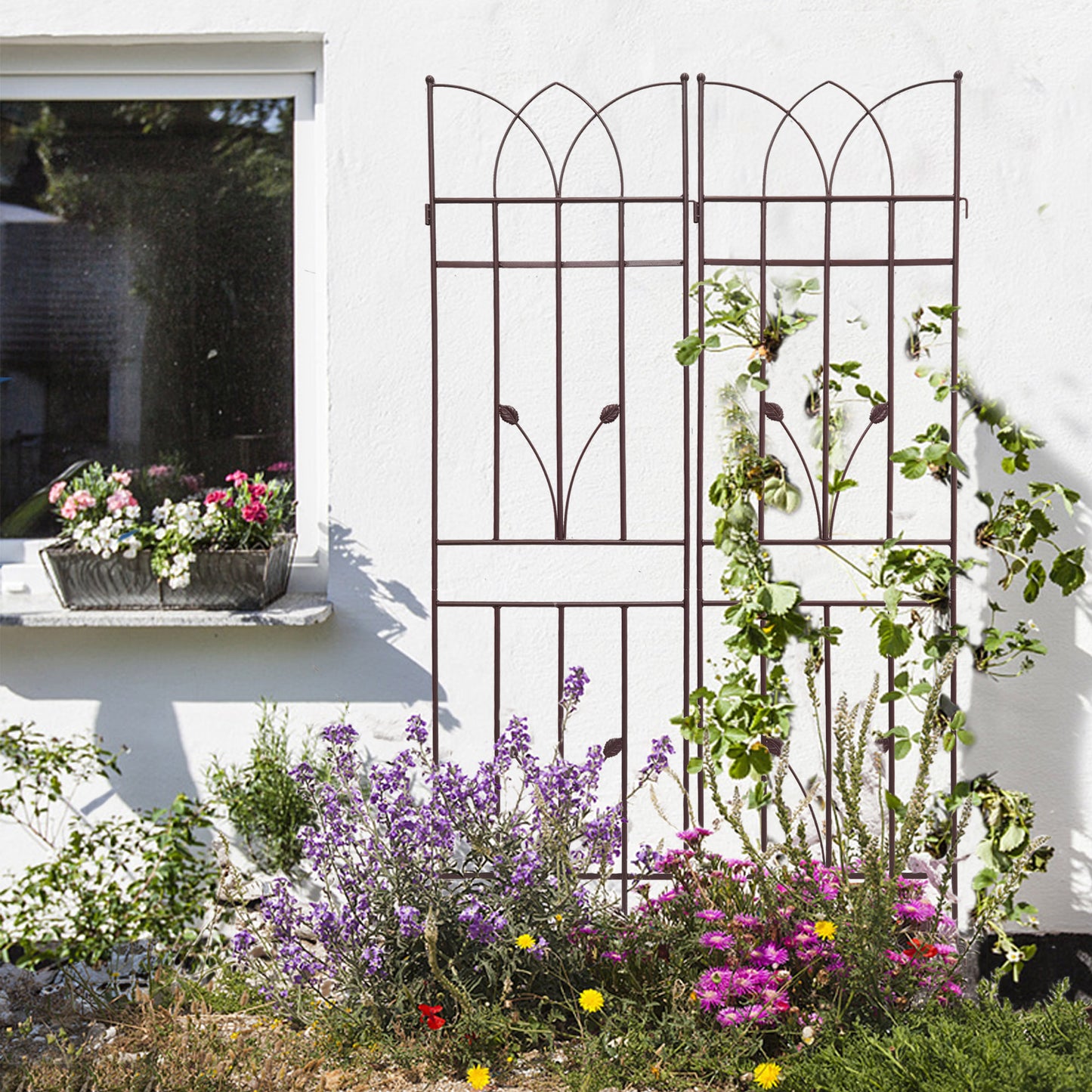 Decorative wrought iron garden trellis with arched top perfect for climbing plants