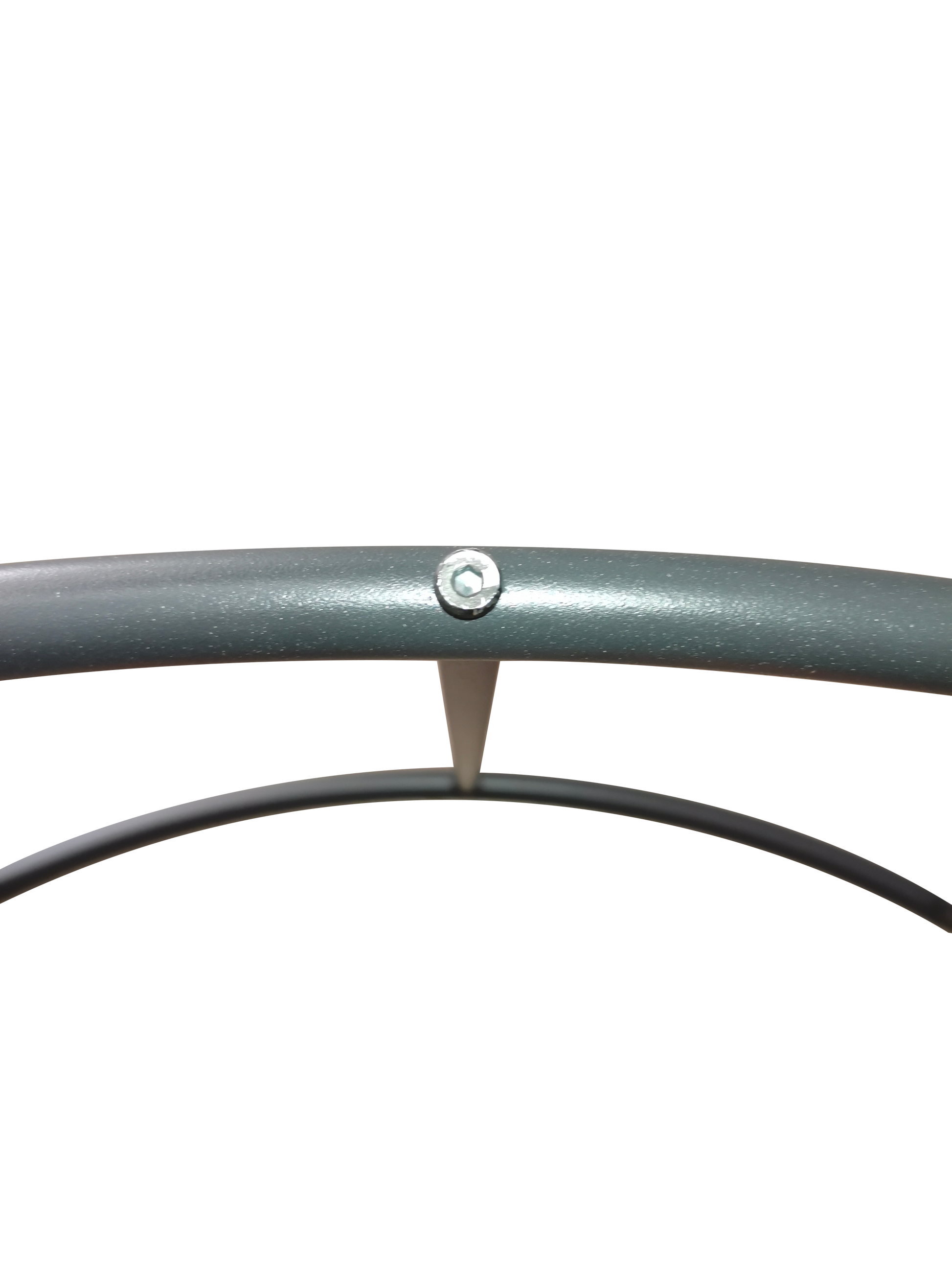 Closeup of a metallic gray round metal frame with a hex screw detail