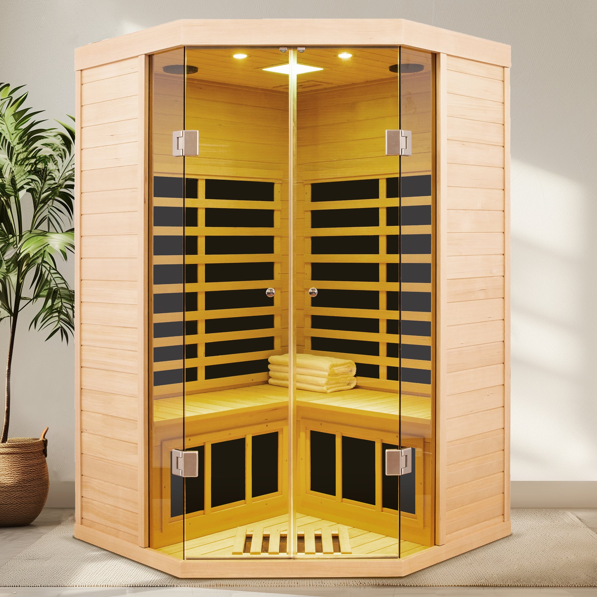 Corner infrared sauna with natural wood exterior and glass doors seating two