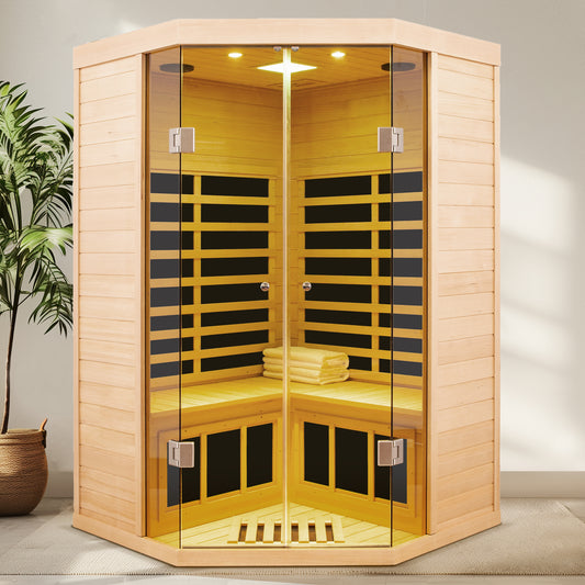 Corner infrared sauna with natural wood exterior and glass doors seating two