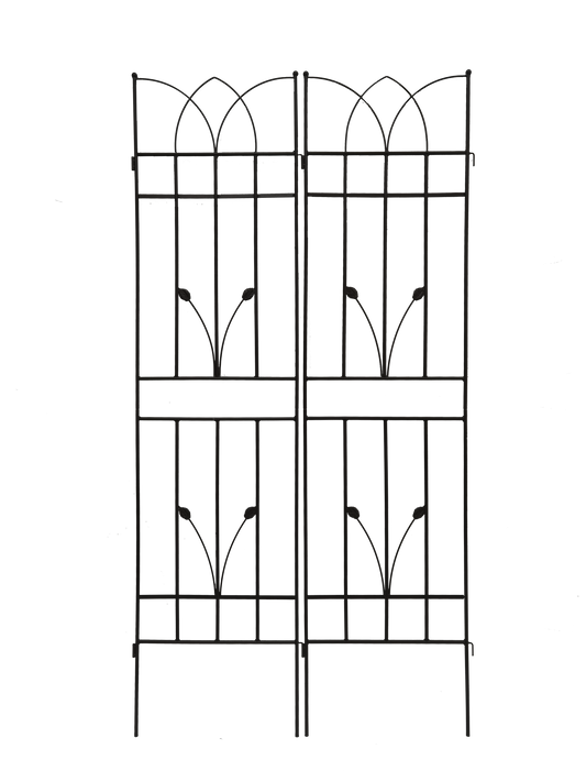 Black metal garden gate with ornate arch and leaf accents