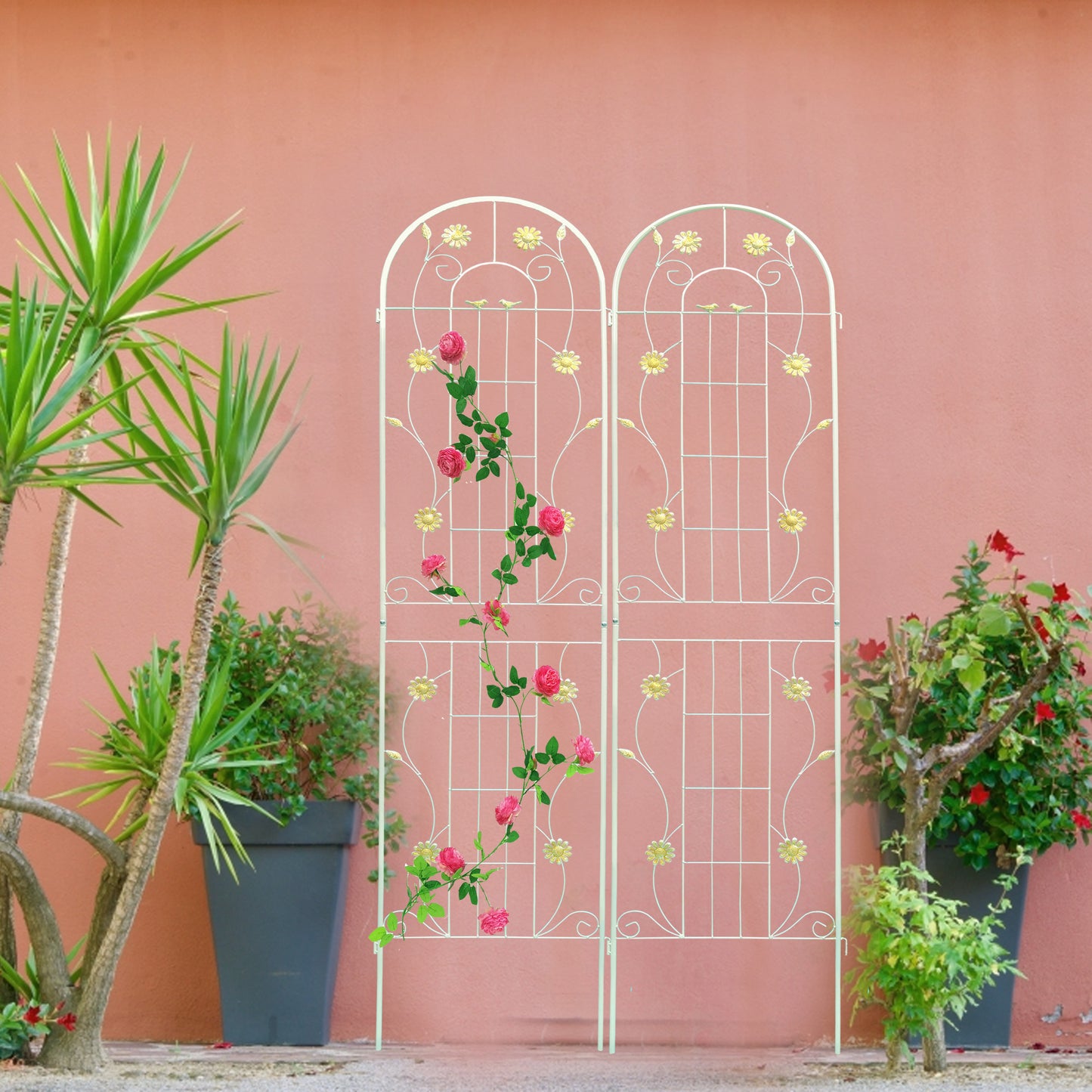 White metal garden trellis with climbing pink roses and decorative yellow flowers