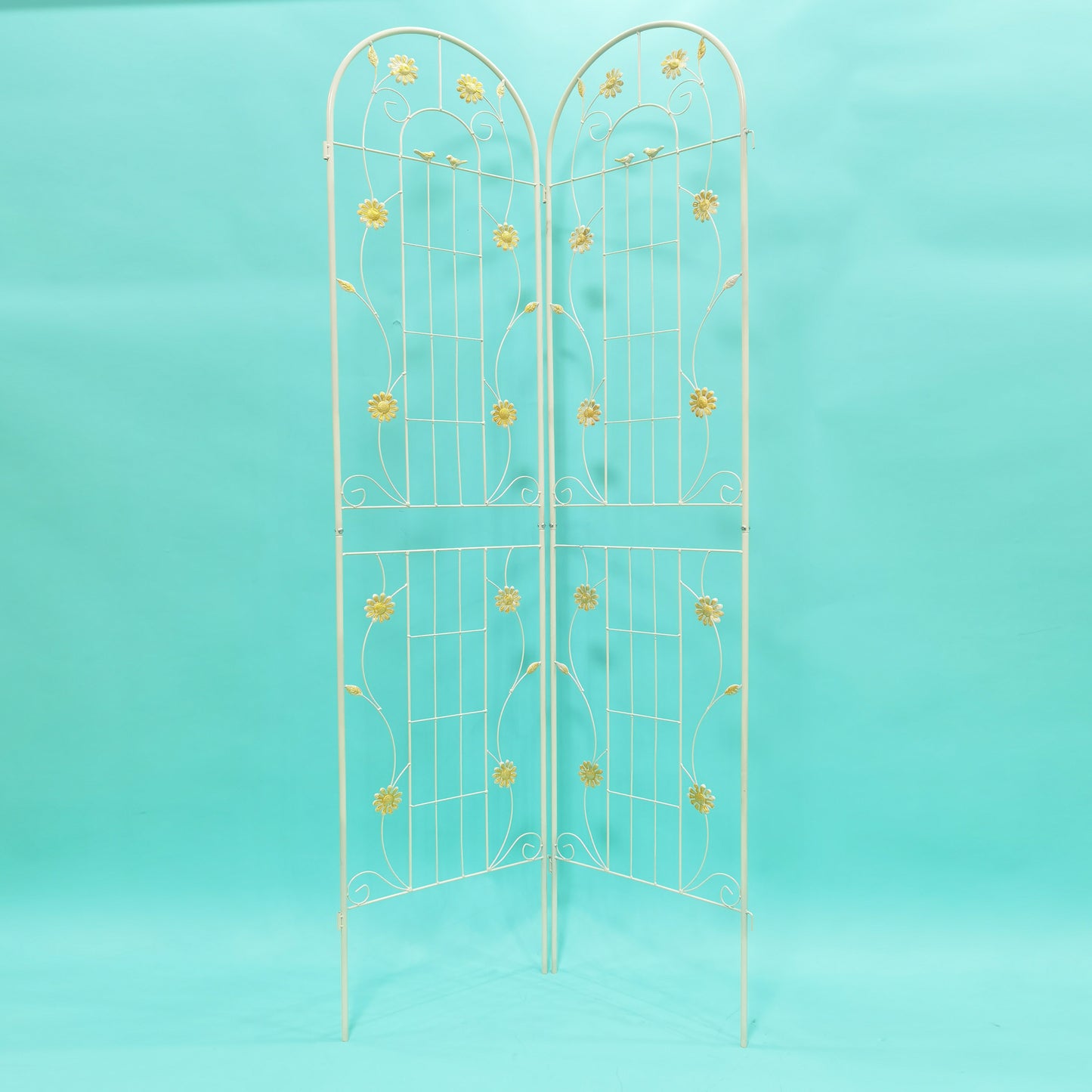 Decorative white metal garden trellis with floral accents ideal for climbing plants