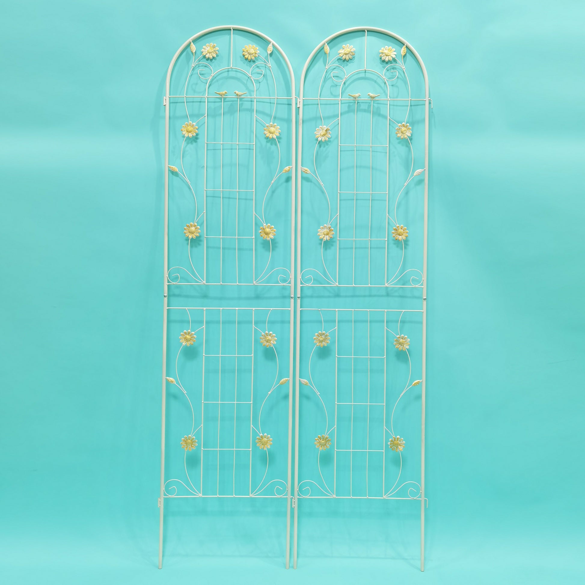 Cream metal garden trellis with floral accents and arched top perfect for climbing plants