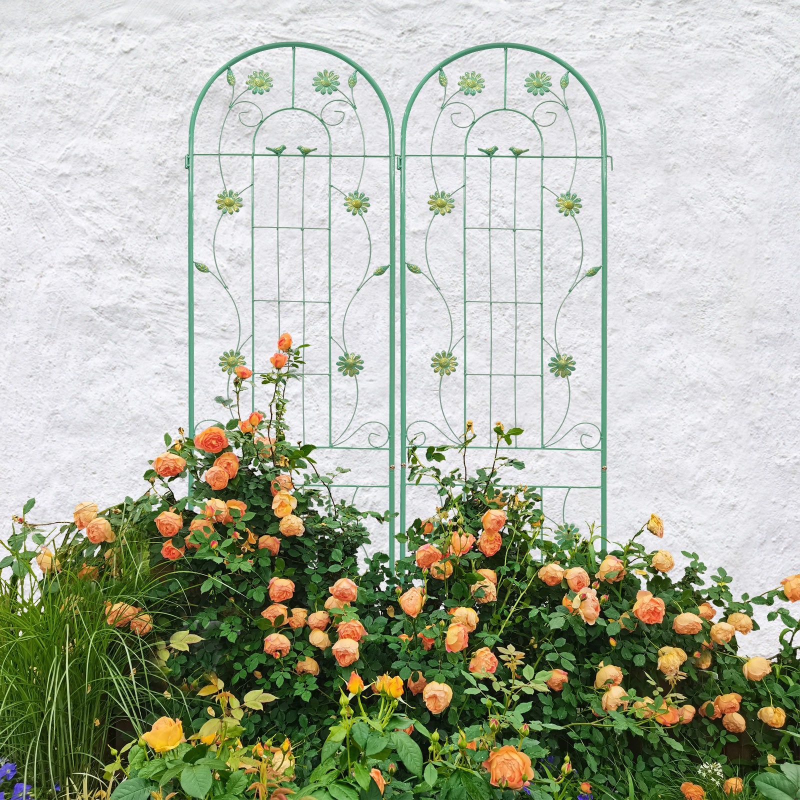 Elegant green garden trellis with decorative floral and bird motifs