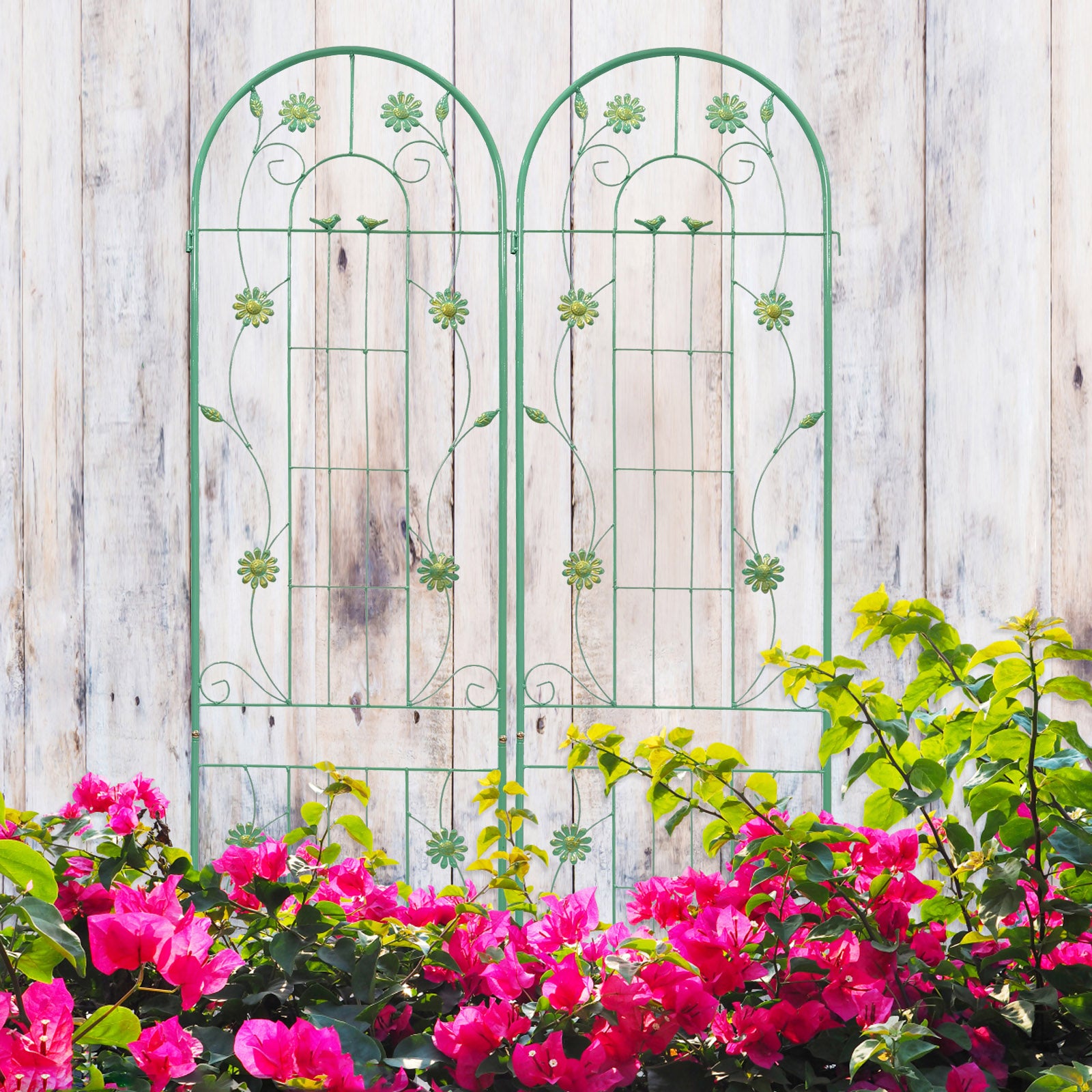 Green metal garden trellis with floral and bird accents perfect for climbing plants