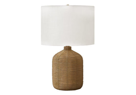 Woven rattan table lamp with offwhite linen shade perfect for coastal decor