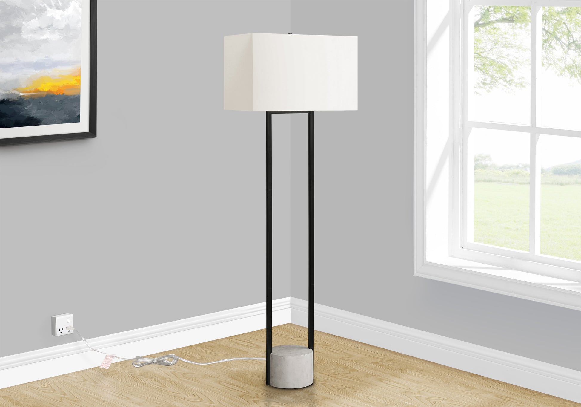 Modern black floor lamp with concrete base and white rectangular shade