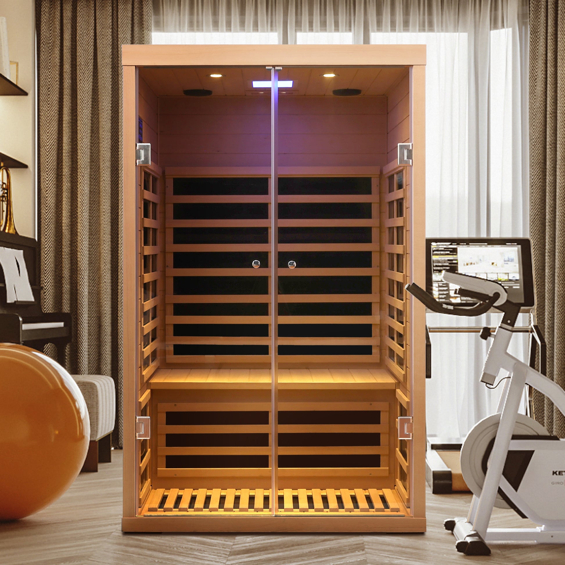 Spacious twoperson cedar infrared sauna with glass doors builtin lighting and comfortable seating