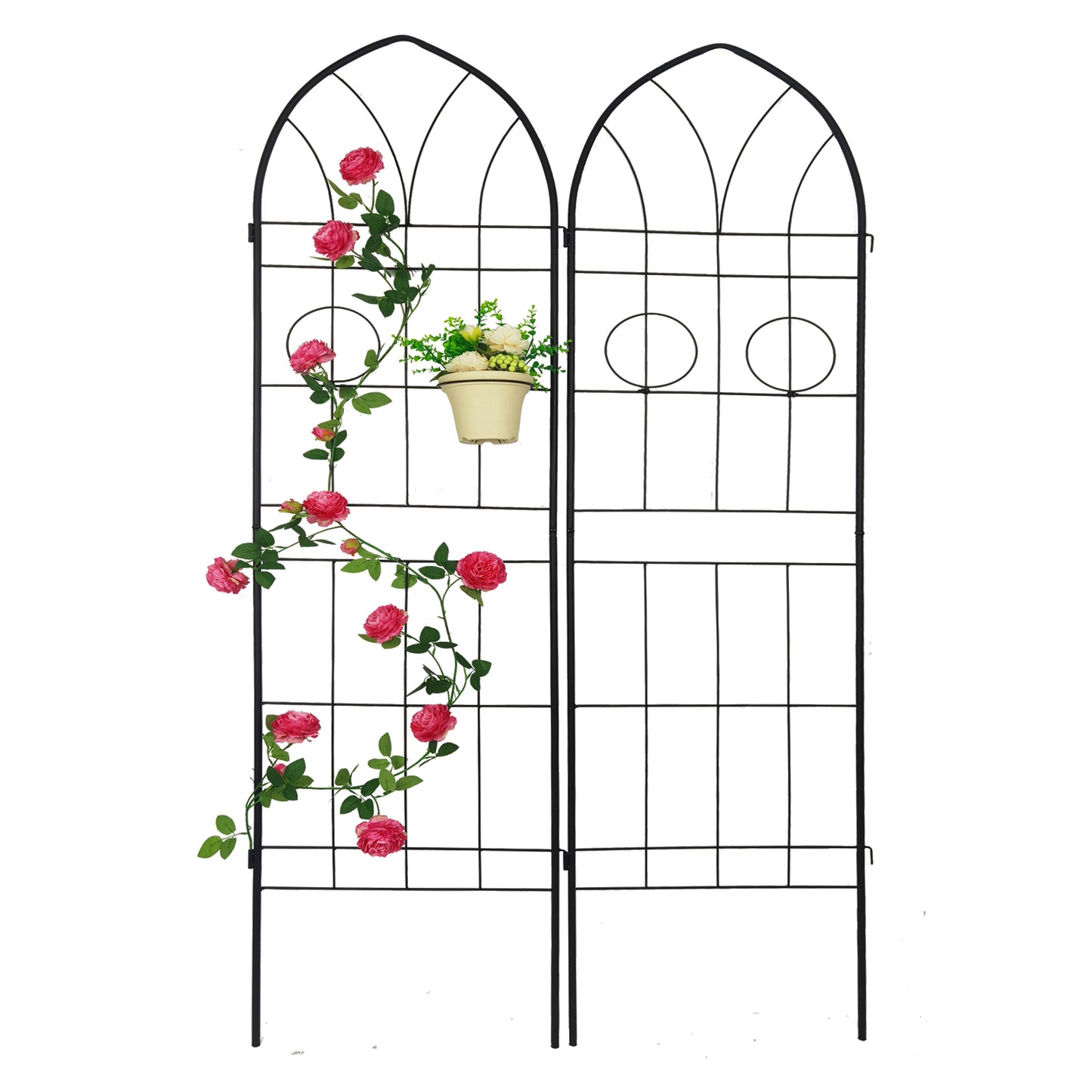 Black metal garden trellis with pink roses and a pot of flowers