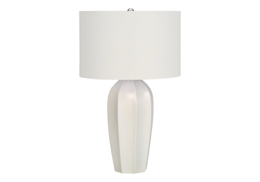 White ceramic table lamp with textured drum shade for modern decor