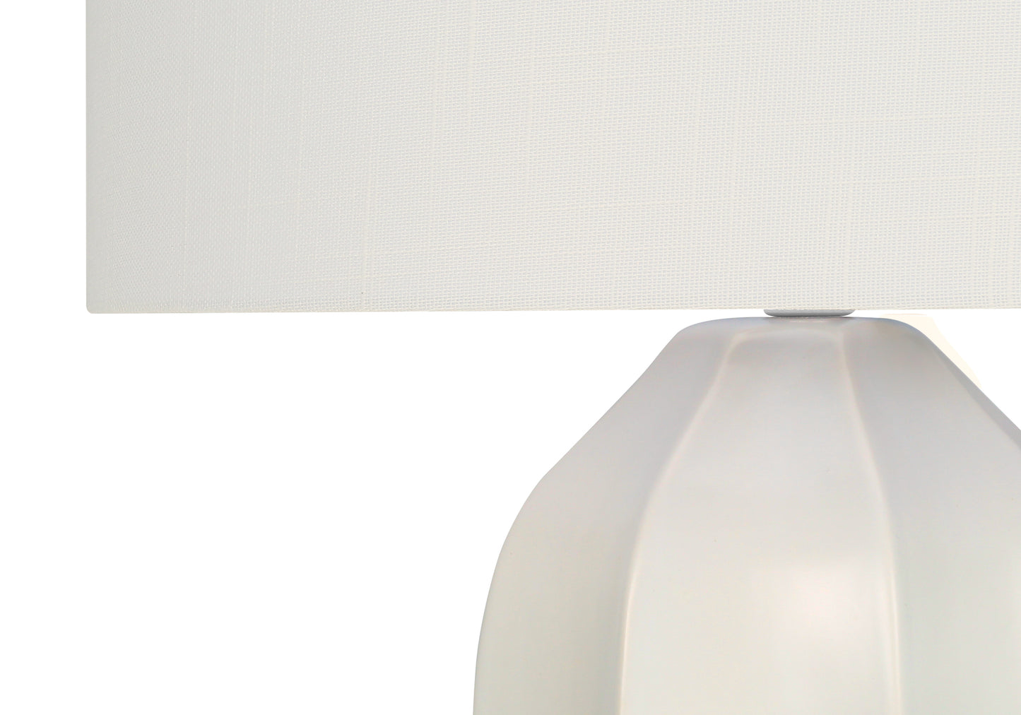 White ceramic table lamp with a textured fabric shade for modern living spaces