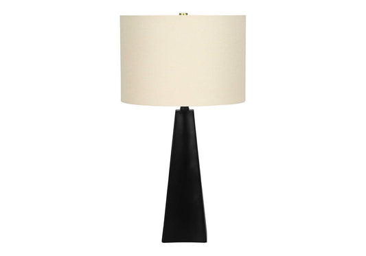 Black tapered base table lamp with cream linen shade