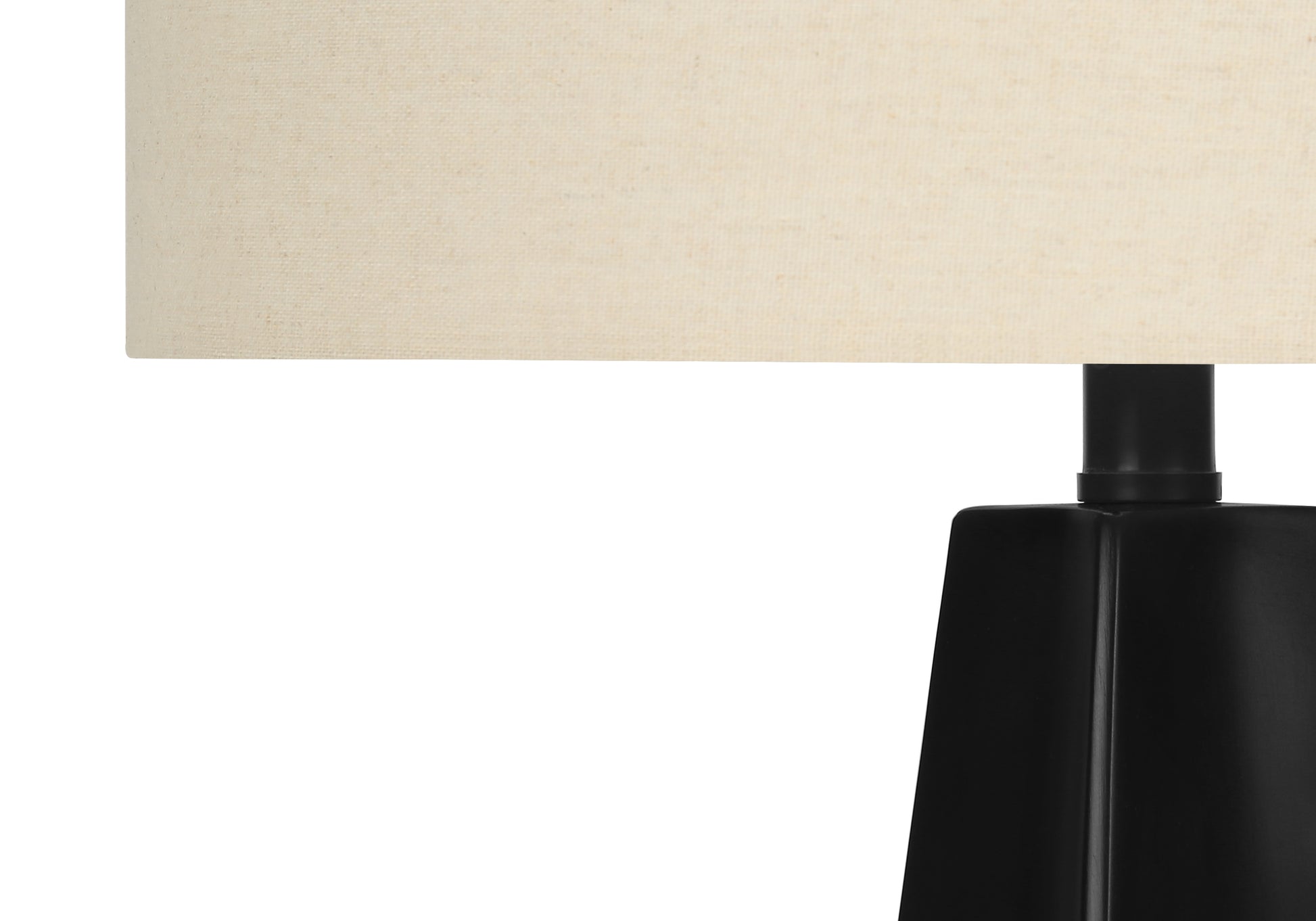 Black geometric base table lamp with textured cream linen shade