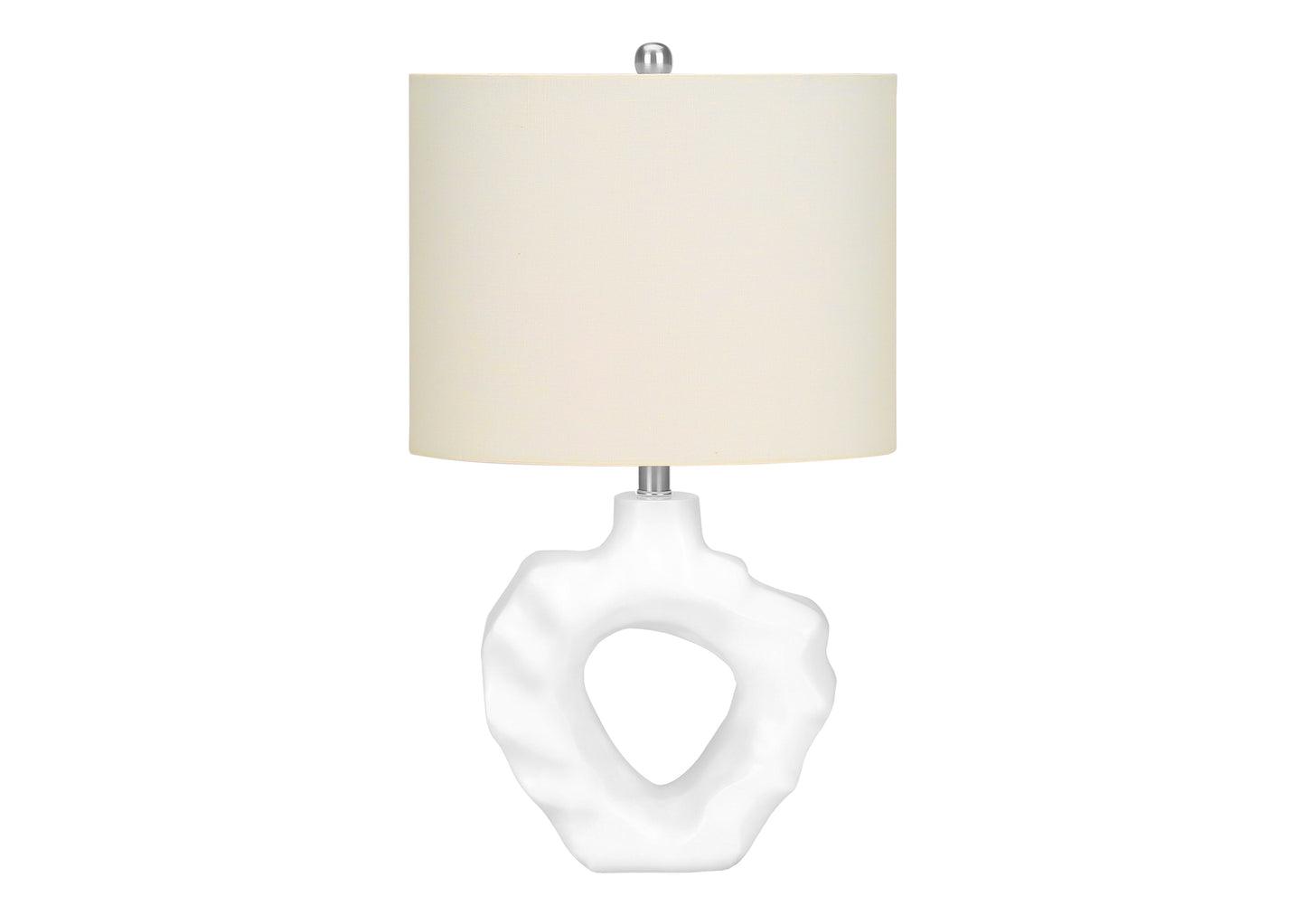 Organic white ceramic table lamp with abstract cutout base and ivory linen shade