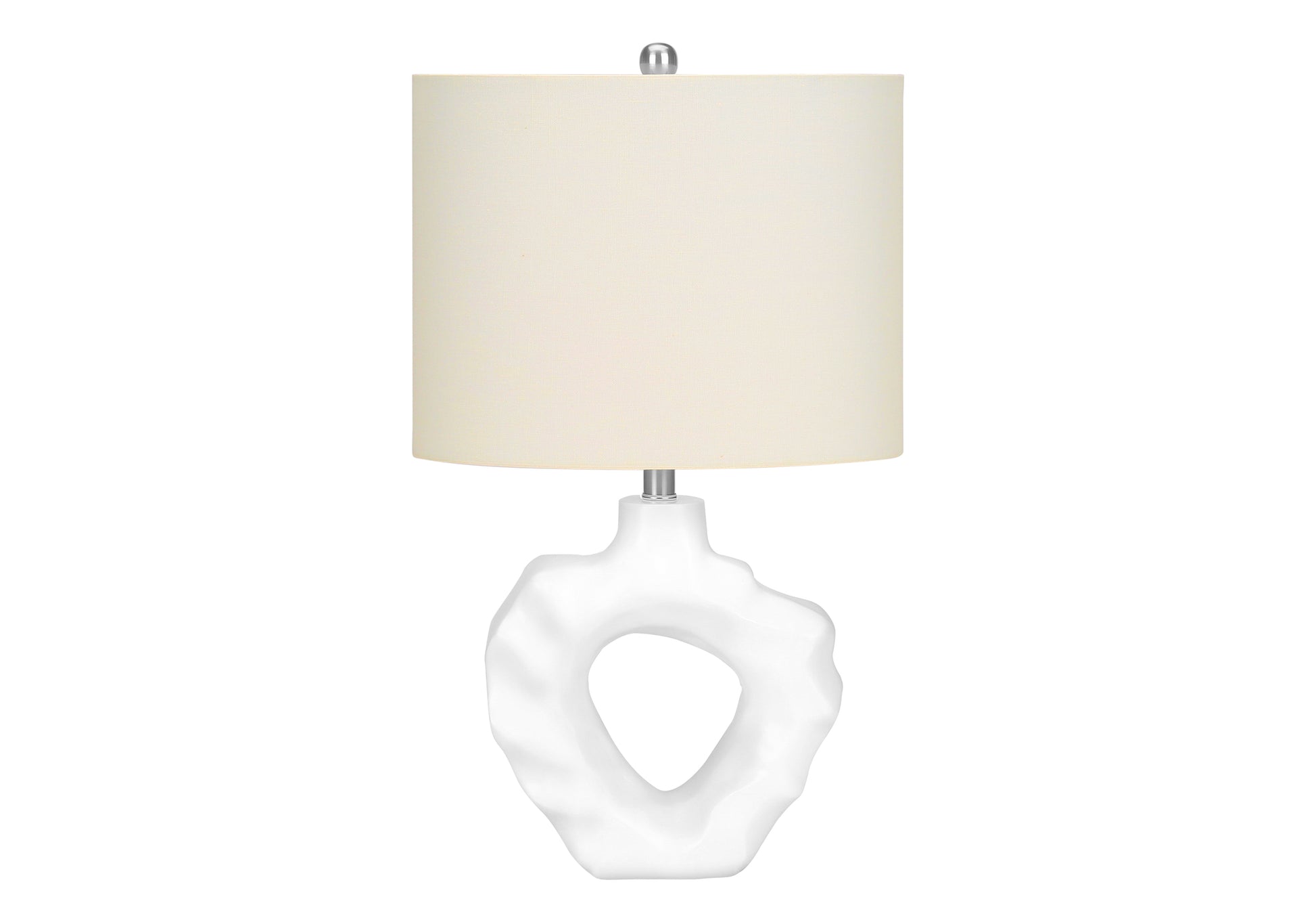 Organic white ceramic table lamp with abstract cutout base and ivory linen shade