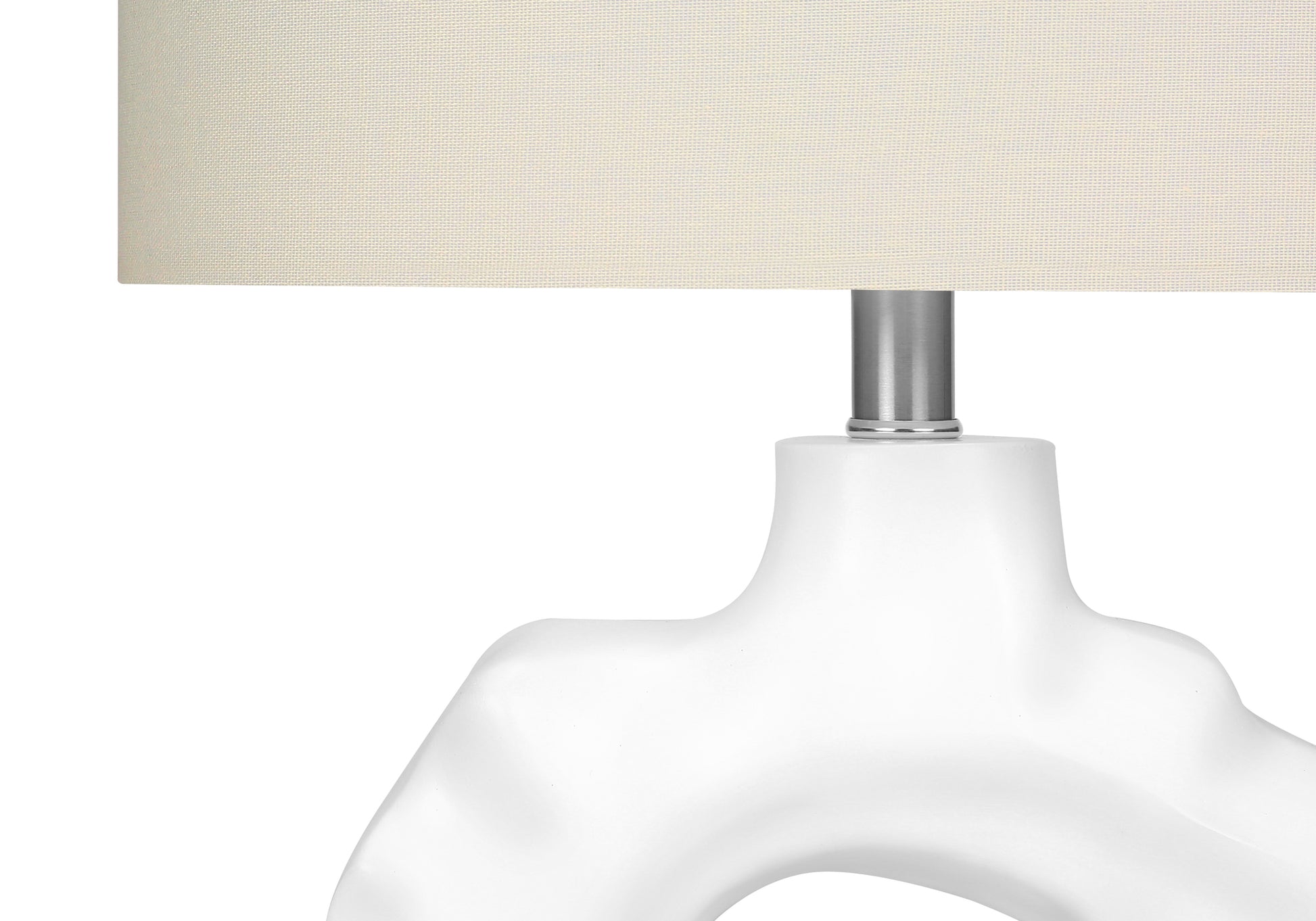 White ceramic sculptural table lamp with offwhite linen shade