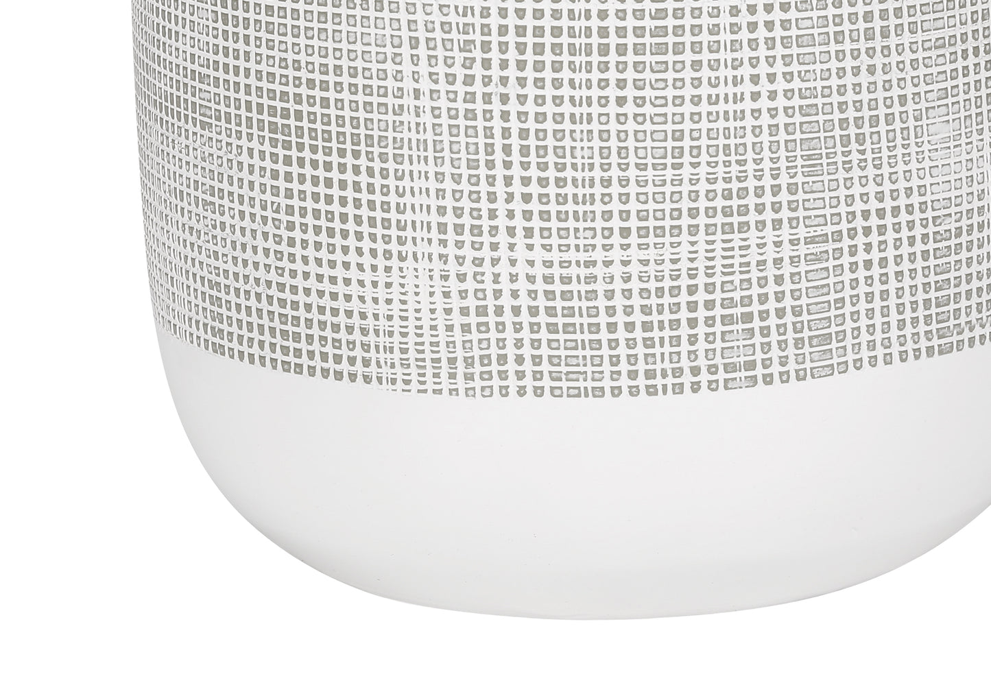 Closeup of a textured white ceramic vase with a subtle grey grid pattern