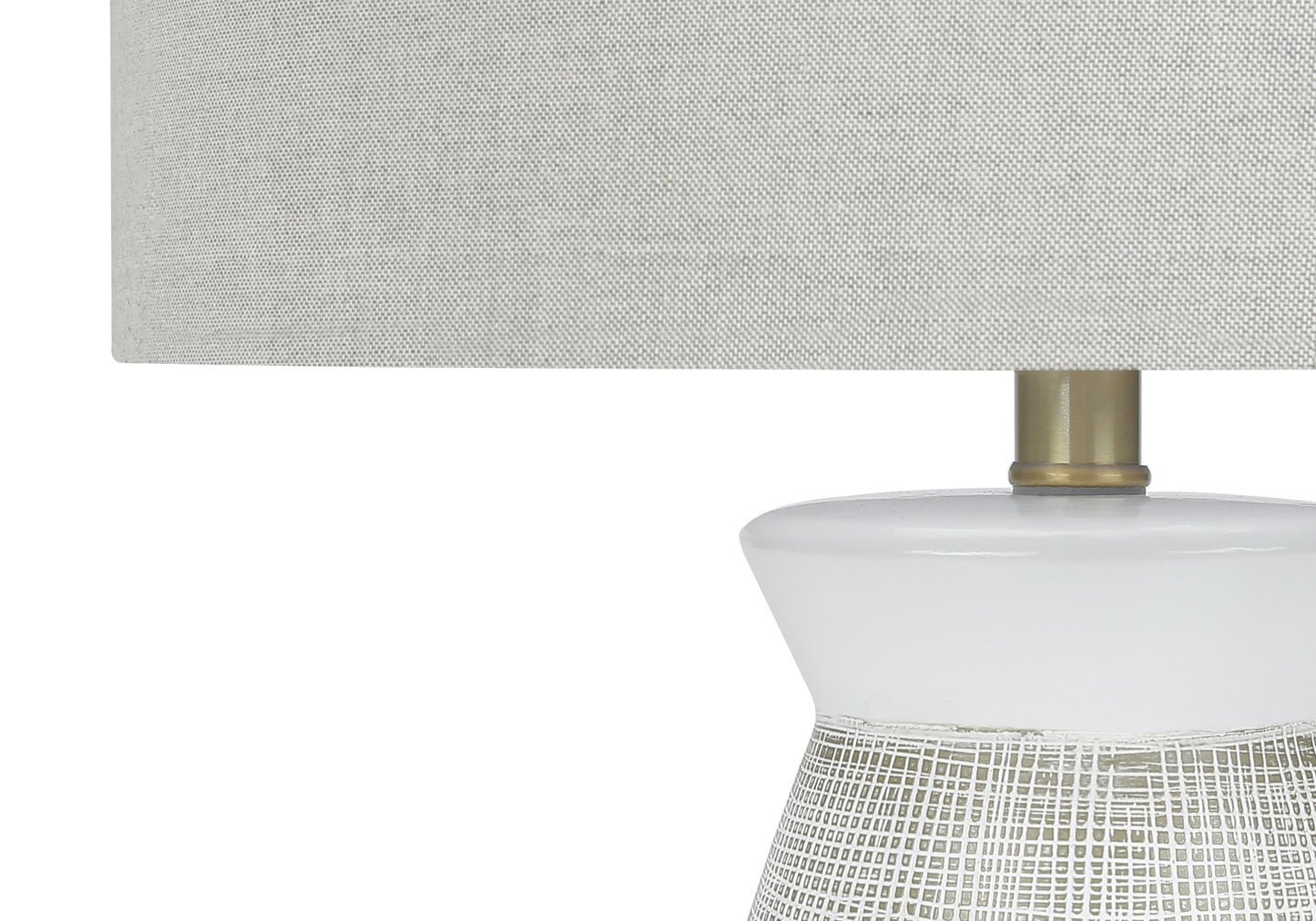 Textured ceramic table lamp with white drum shade and brass accent