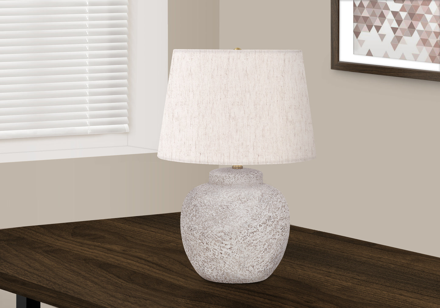 Textured ceramic table lamp with offwhite linen shade for ambient lighting