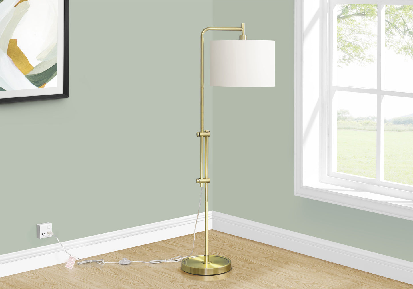 Modern brass floor lamp with adjustable arm and white drum shade perfect for living room lighting