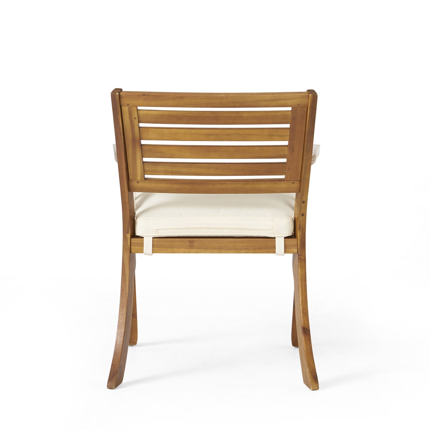 Wooden dining chair with slatted back and cream cushion for outdoor use