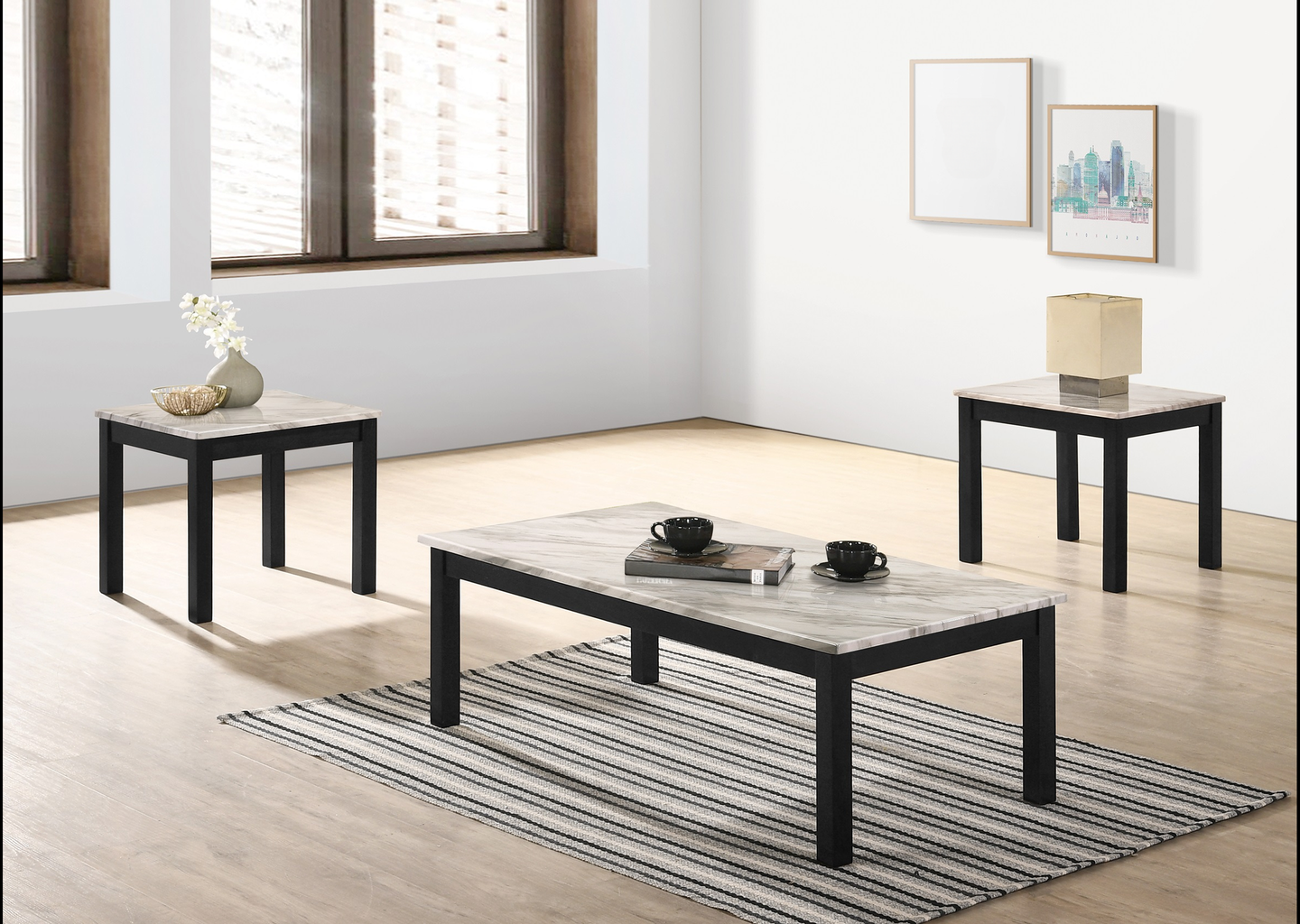 Black metal coffee table with faux marble top featuring two cups
