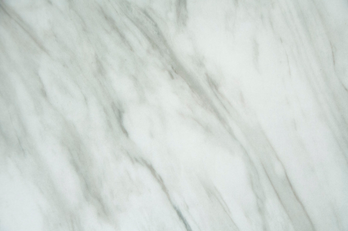 White marble texture with gray veins ideal for countertops