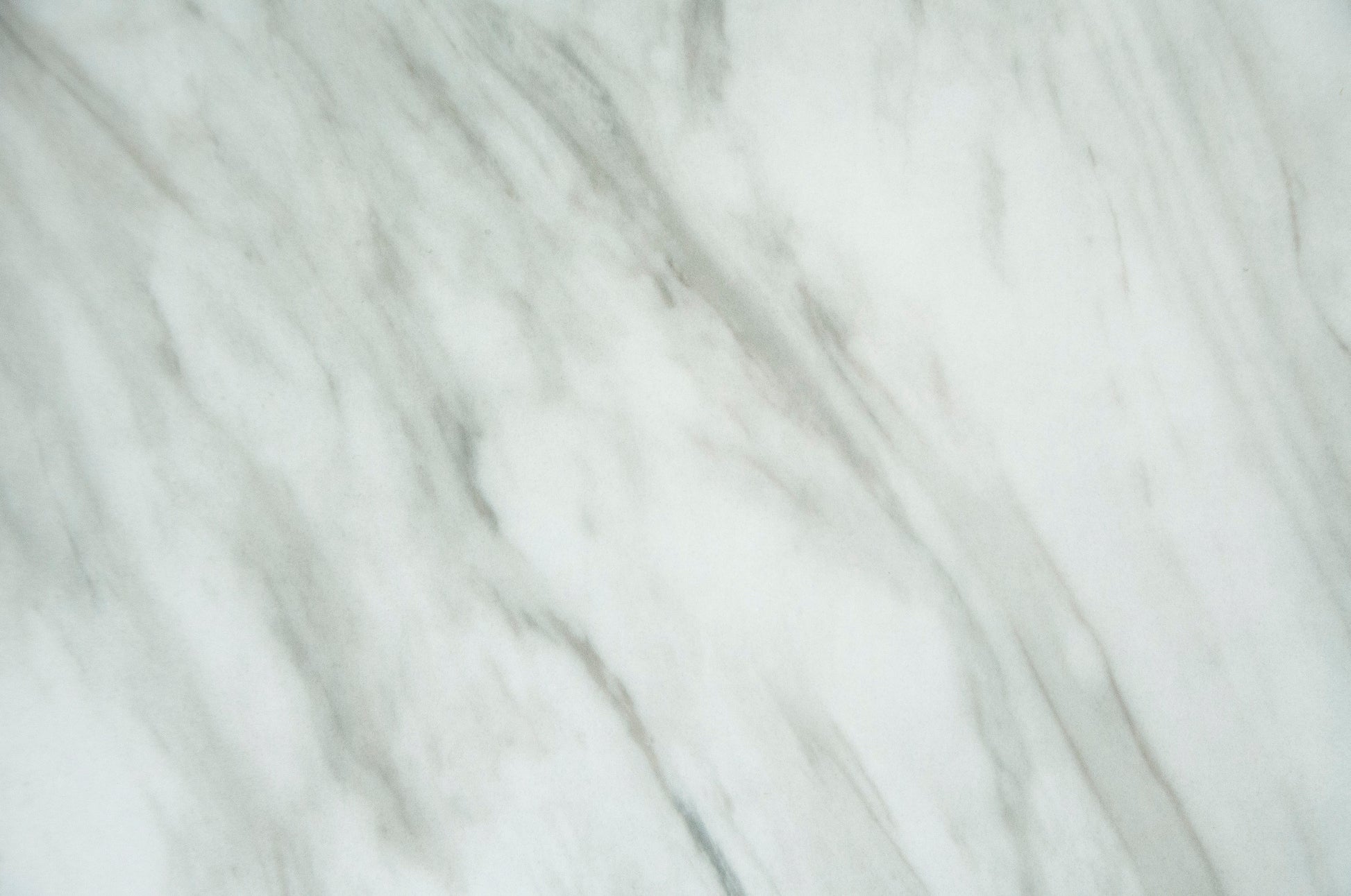 White marble texture with gray veins ideal for countertops