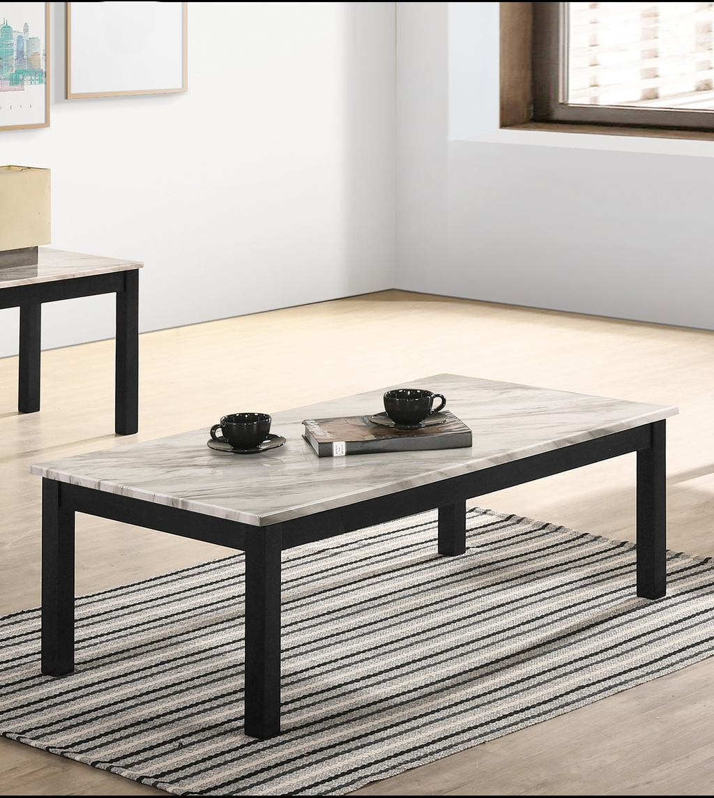 Rectangular marble top coffee table with black legs perfect for modern living rooms
