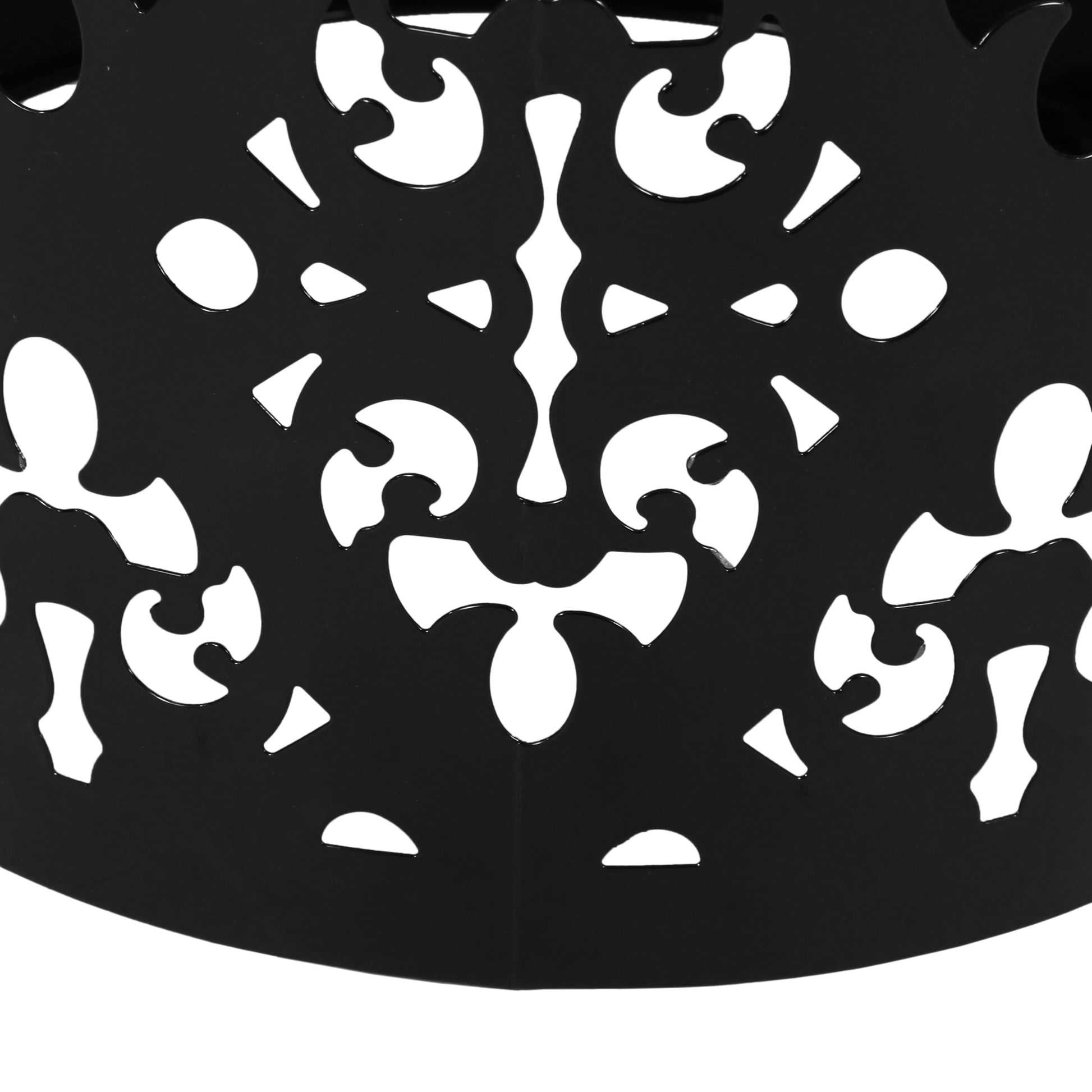 Black metal garden trellis with intricate scrollwork ideal for climbing plants