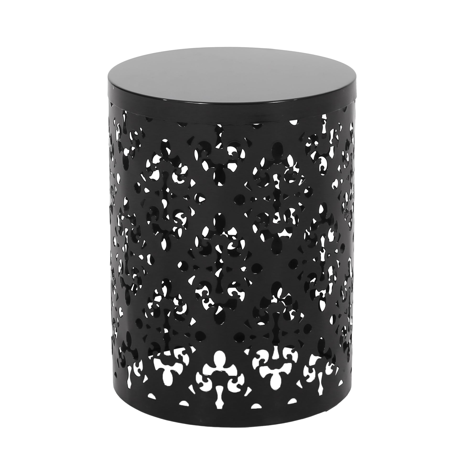 Black metal side table with intricate lasercut floral pattern and smooth top