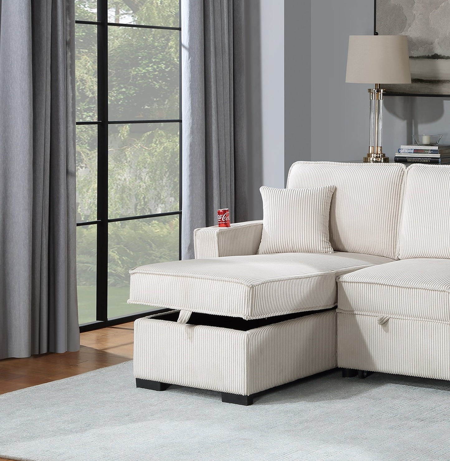Cream corduroy sectional sofa with hidden storage chaise and matching throw pillow