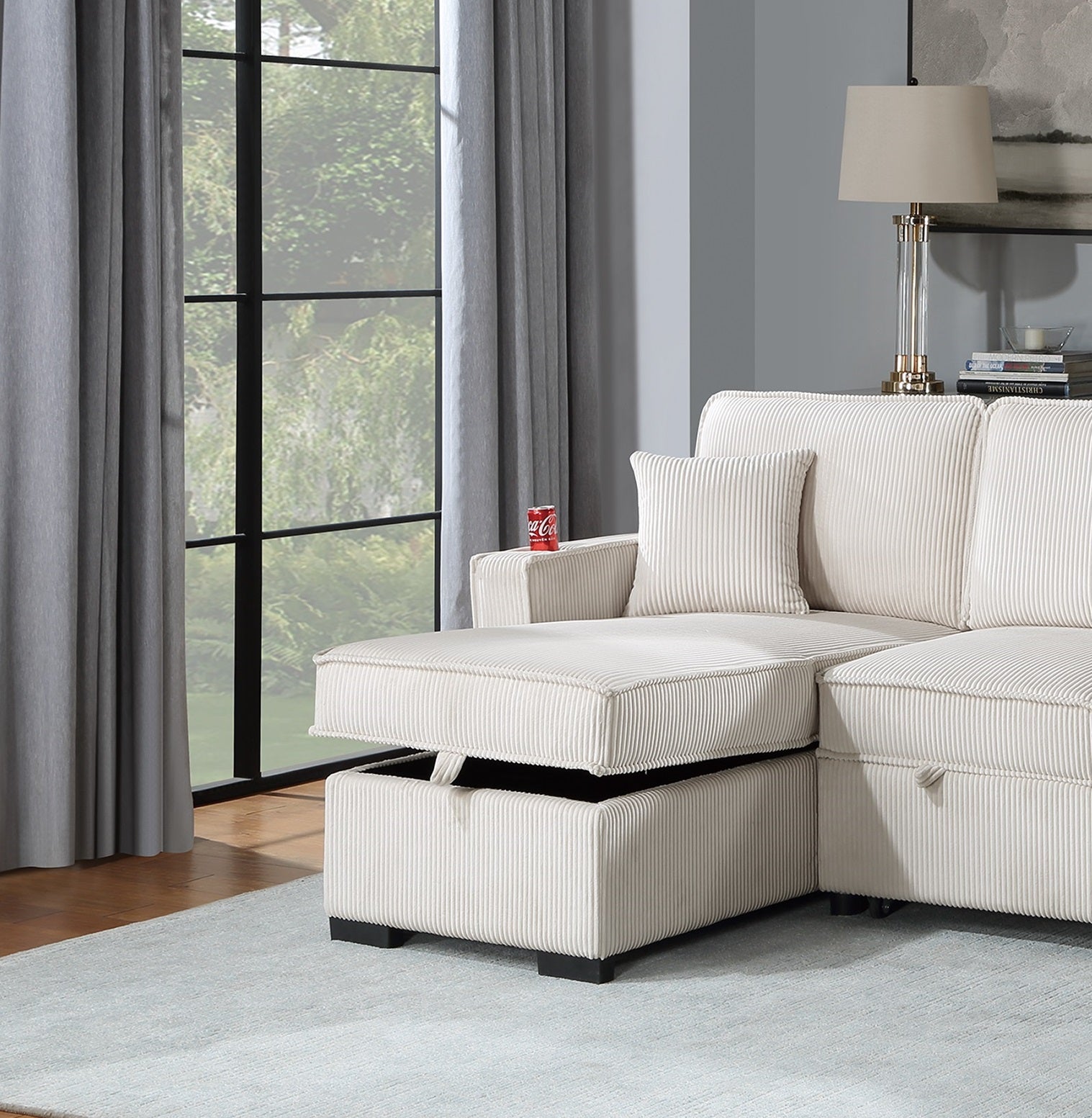 Cream corduroy sectional sofa with hidden storage chaise and matching throw pillow