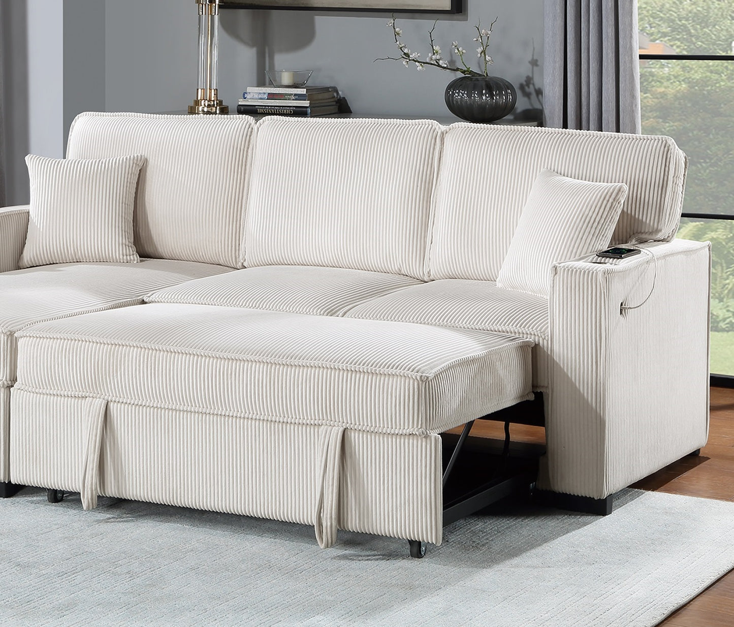 Cream corduroy sectional sofa with pullout bed perfect for small spaces