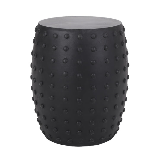 Black ceramic garden stool with raised dot texture and rounded top
