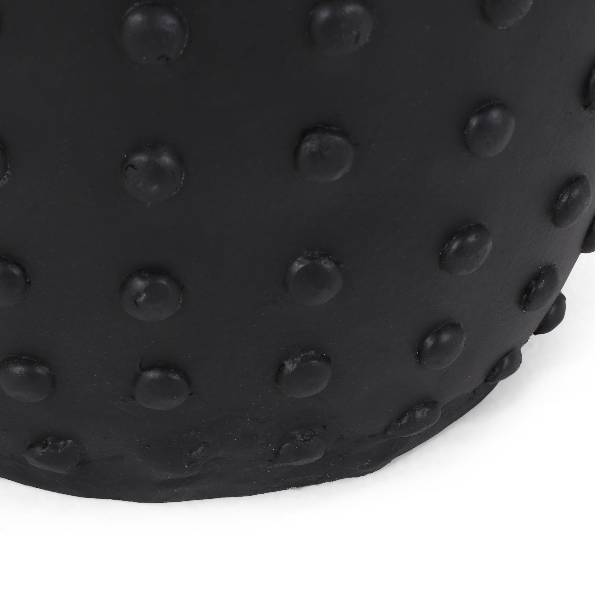 Textured black yoga ball with raised nubs for enhanced grip during workouts