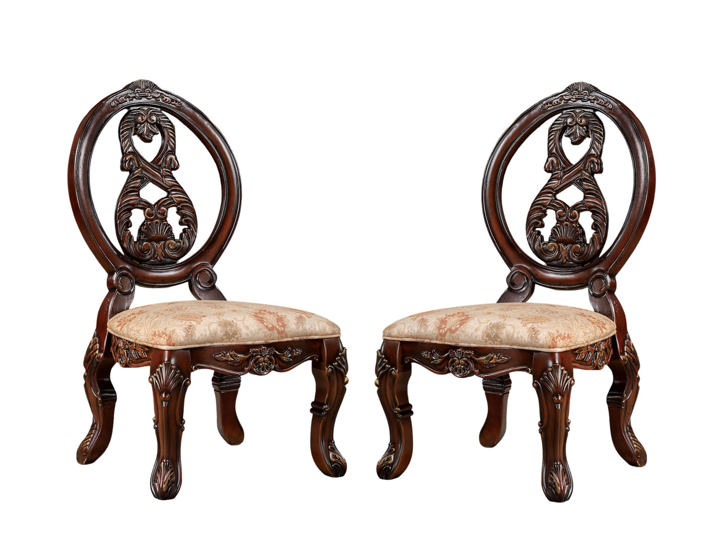 Pair of ornate carved mahogany dining chairs with floral upholstered seats