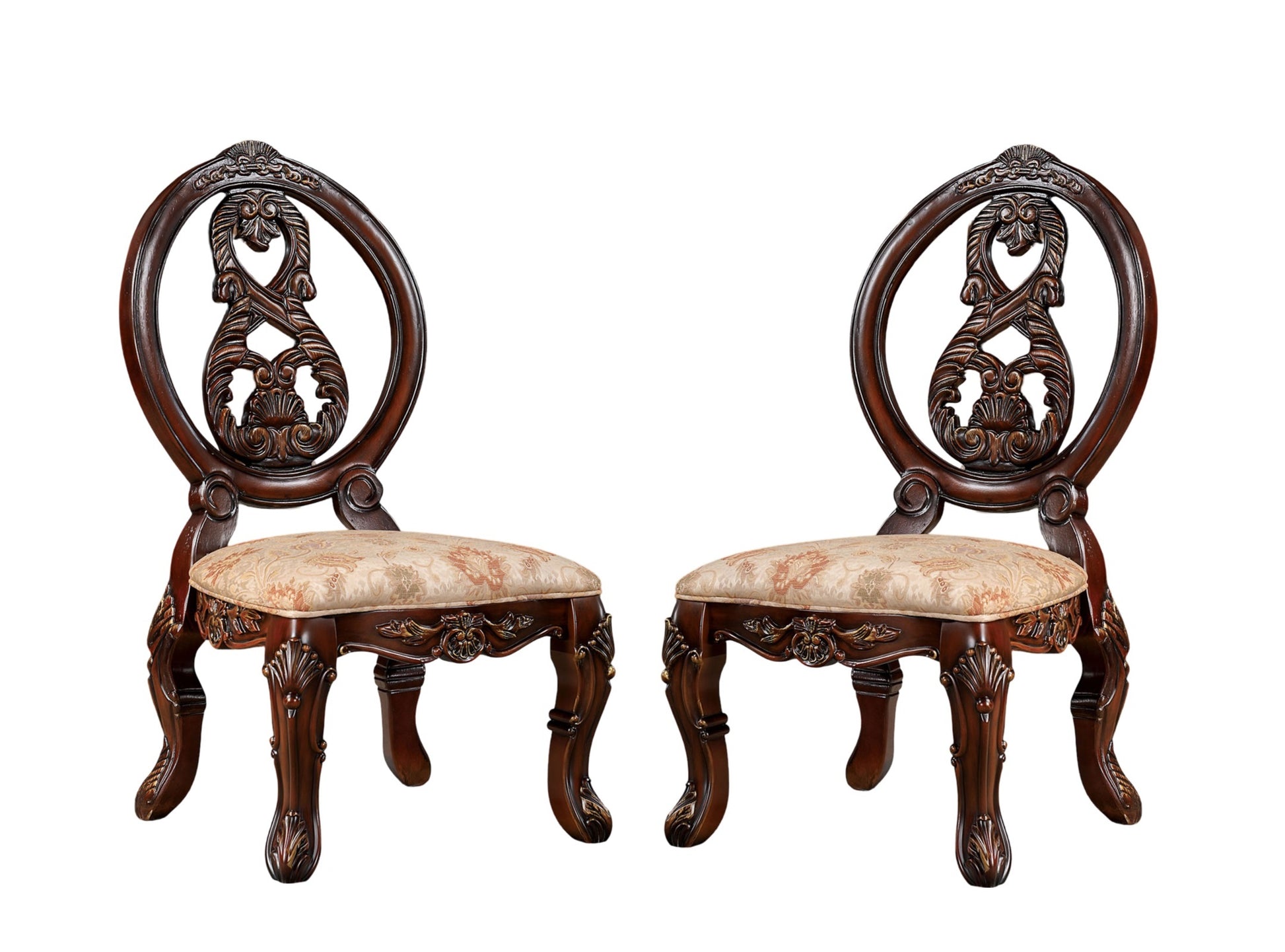 Pair of ornate carved mahogany dining chairs with floral upholstered seats