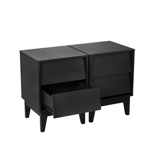 Two black wooden nightstands with angled fronts one drawer open on tapered legs