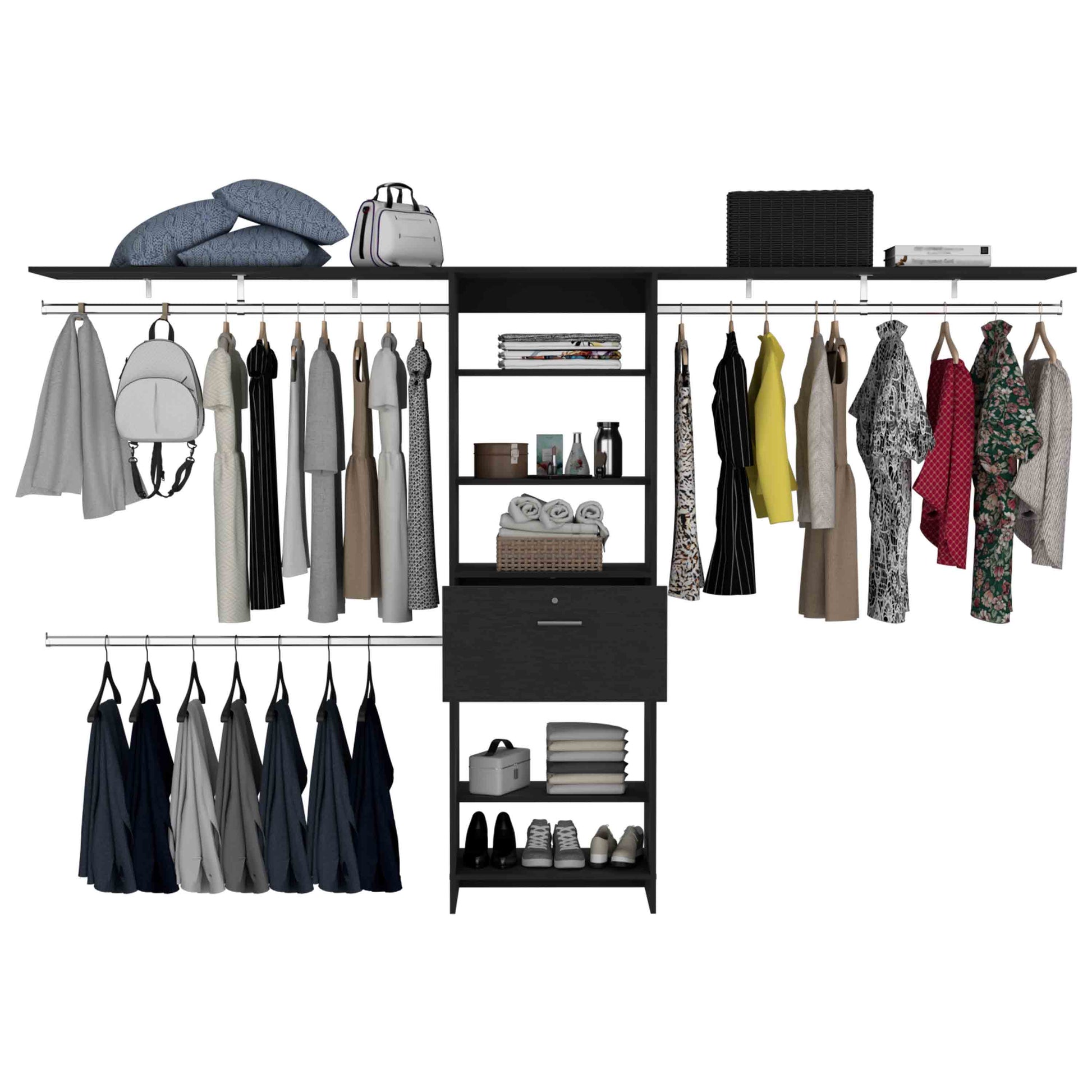 Stacked grey textured pillows on black shelf