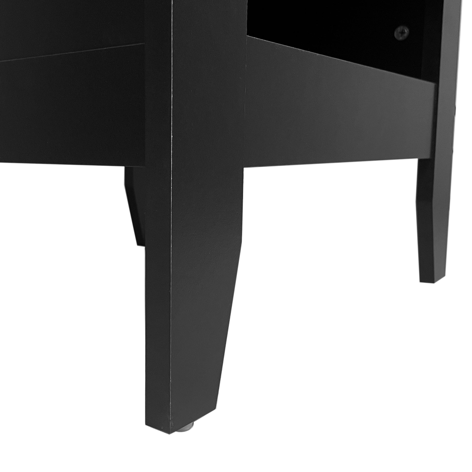 Closeup of black modern furniture leg with screw detail