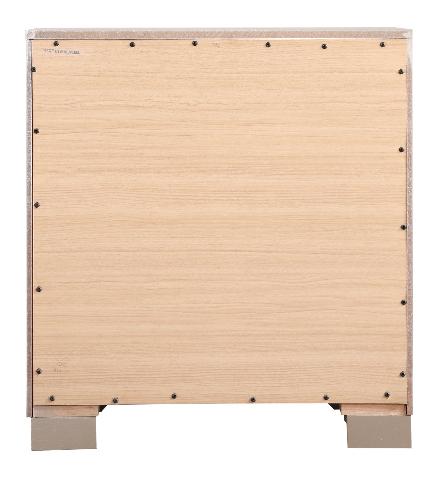 Back panel of a light wood finish dresser showing construction details and Made in Malaysia stamp