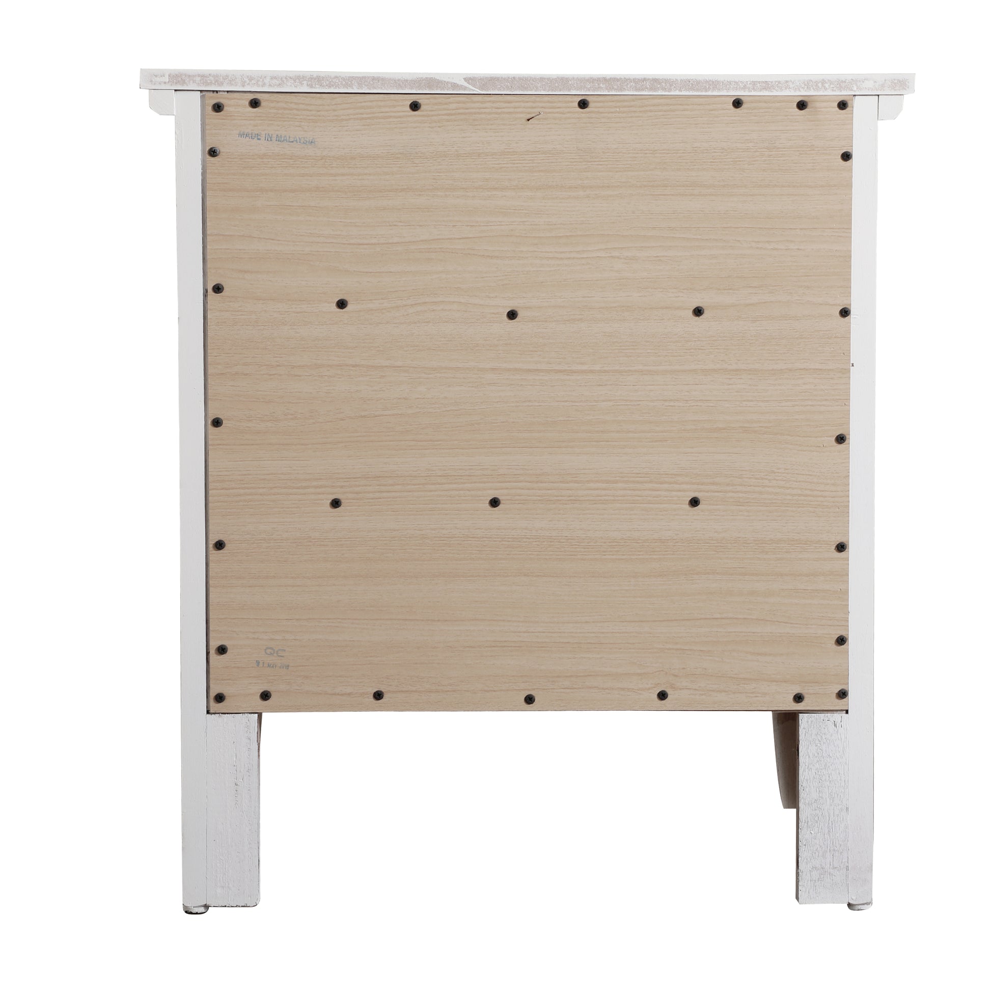 White wooden bedside table back panel with visible screws and Made in Malaysia stamp