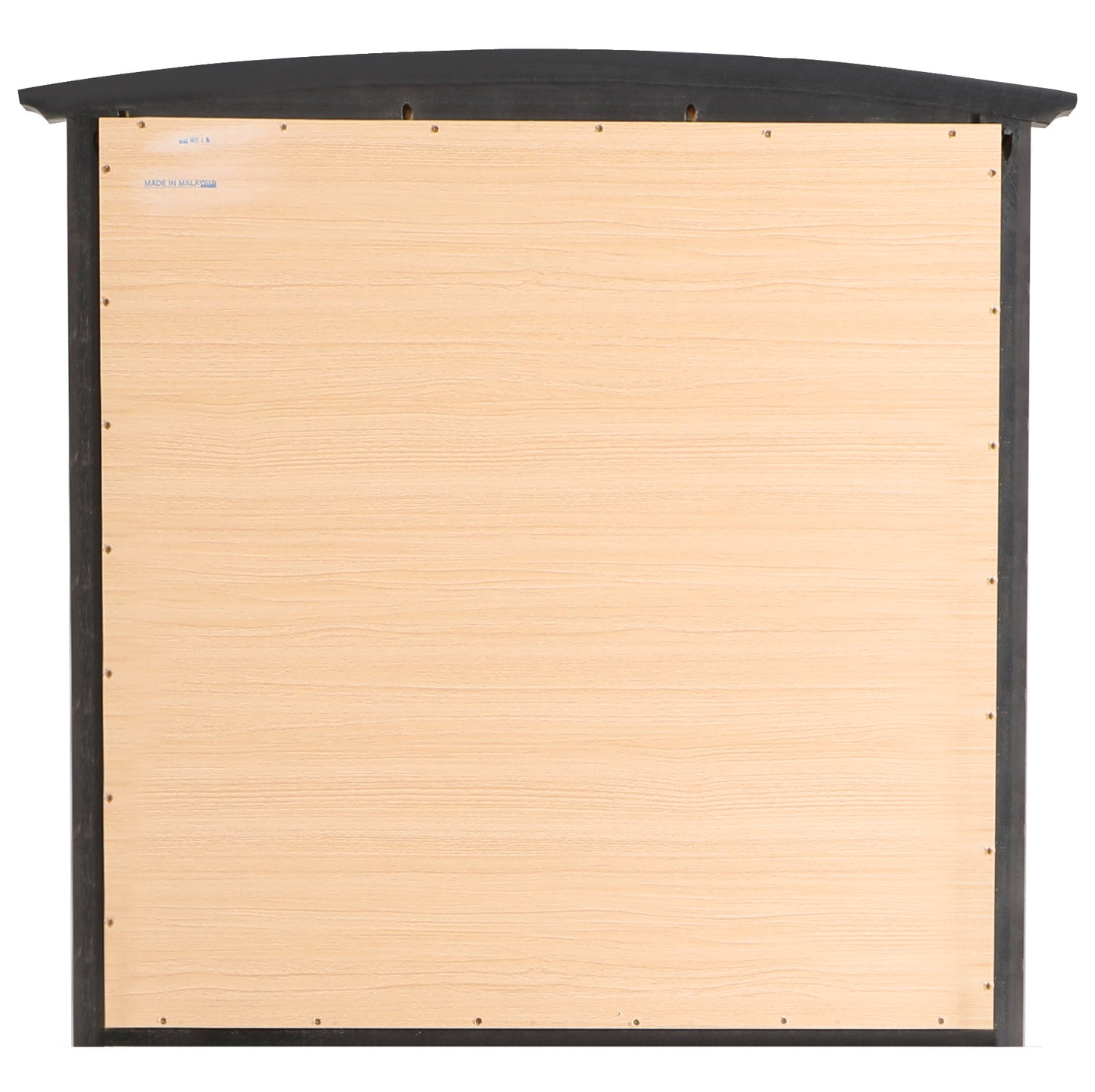 Closeup of the back of a black framed bulletin board with a light wood grain inset