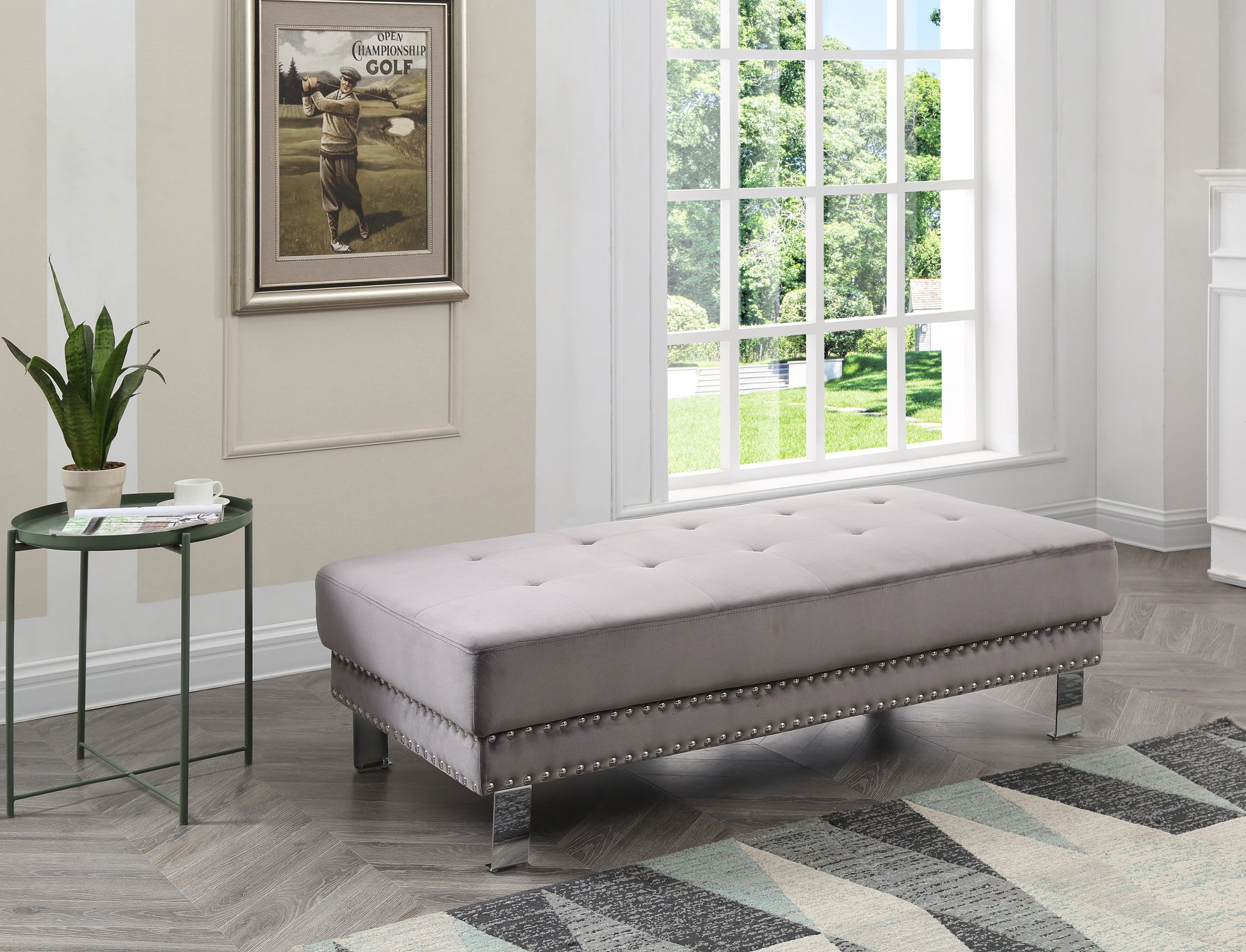 Tufted grey velvet rectangular ottoman with silver nailhead trim and polished chrome legs