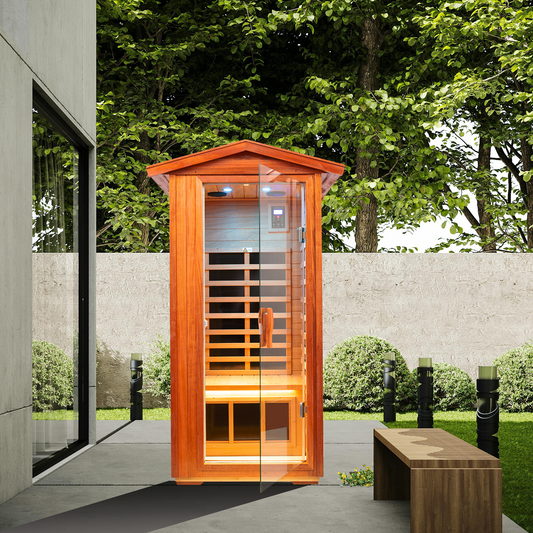 Red cedar infrared sauna cabin with glass door featuring internal benches and LED lighting for relaxation