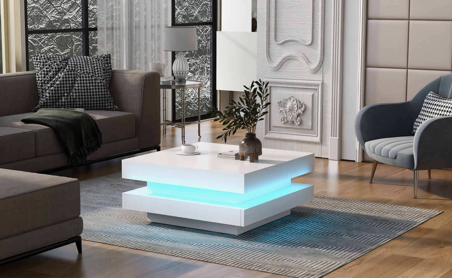 Modern white square coffee table with illuminated blue LED accents and a decorative vase