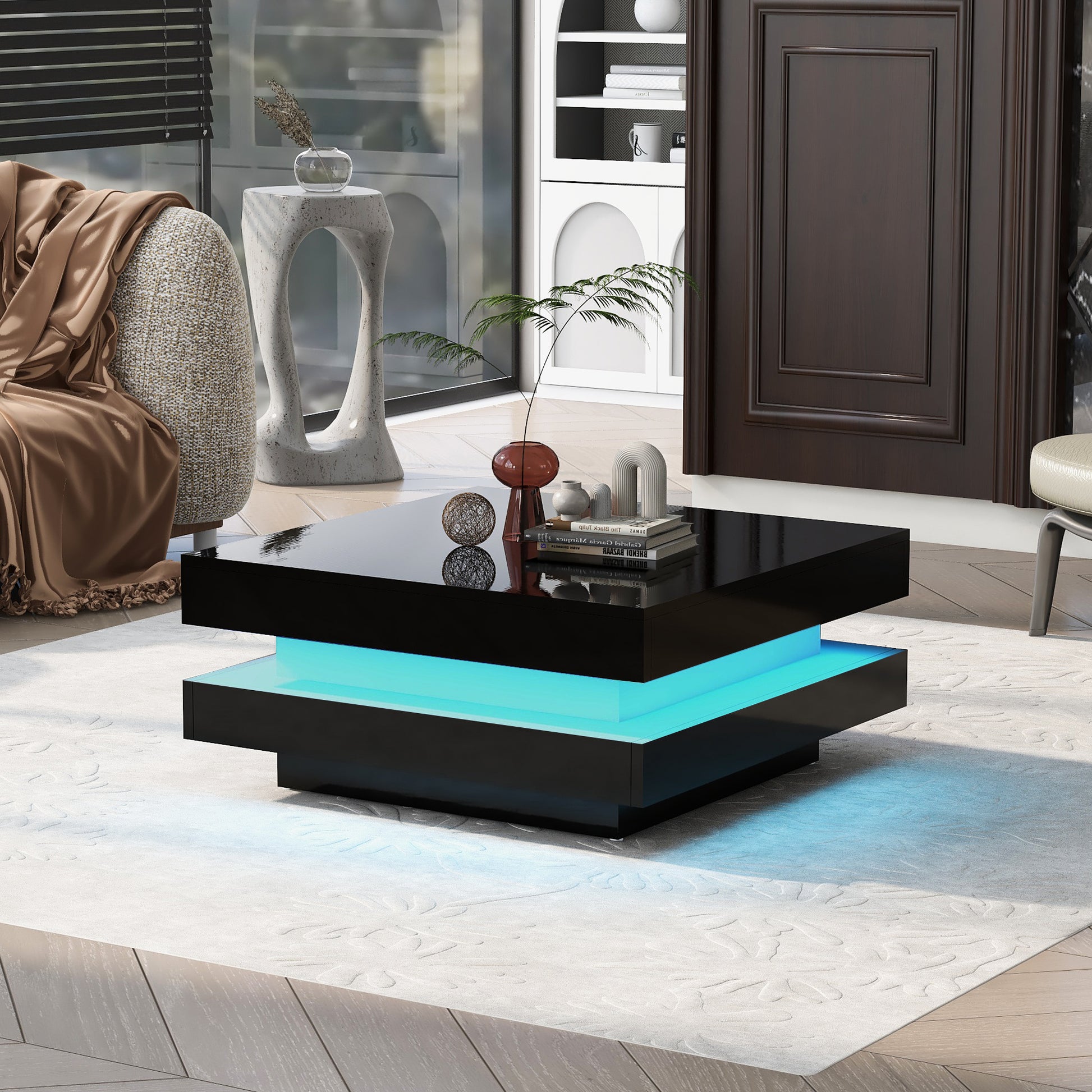 Sleek black high gloss coffee table with integrated blue LED lighting